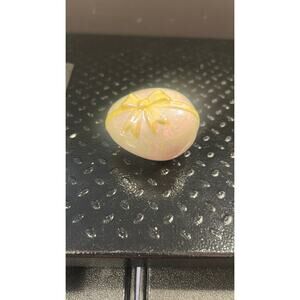 1403. Ceramic egg with yellow bow